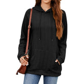 Pull ample à capuche et cordon de serrage de couleur unie